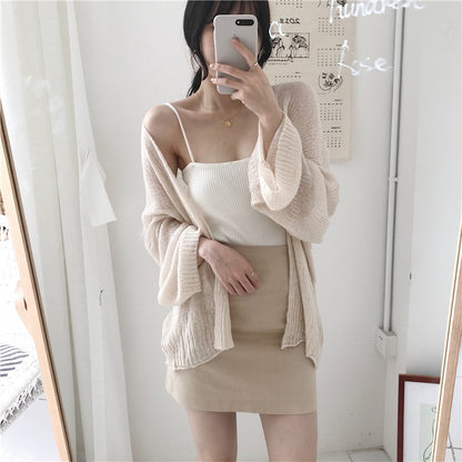 Robe de plage aérienne pour femmes avec des manches larges et un tissu décoratif Chic und Stil