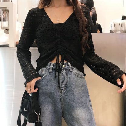 Pull en tricot pour femmes avec un motif de trous décoratif et un cordon réglable Chic und Stil
