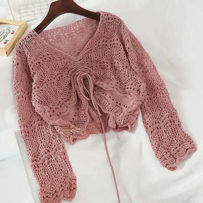 Pull en tricot pour femmes avec un motif de trous décoratif et un cordon réglable Chic und Stil