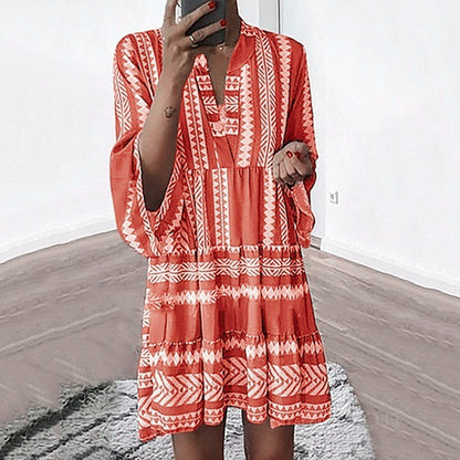 Robe portefeuille décontractée pour femmes avec des manches volumineuses et un motif graphique Chic und Stil