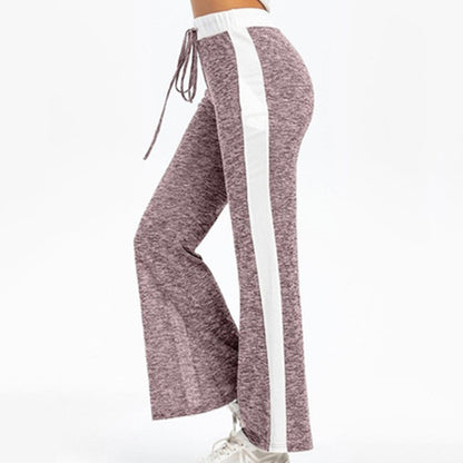 Fluid sports pants for women with side stripes and elastic waist Chic and Style