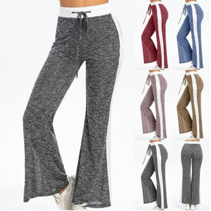 Fluid sports pants for women with side stripes and elastic waist Chic and Style