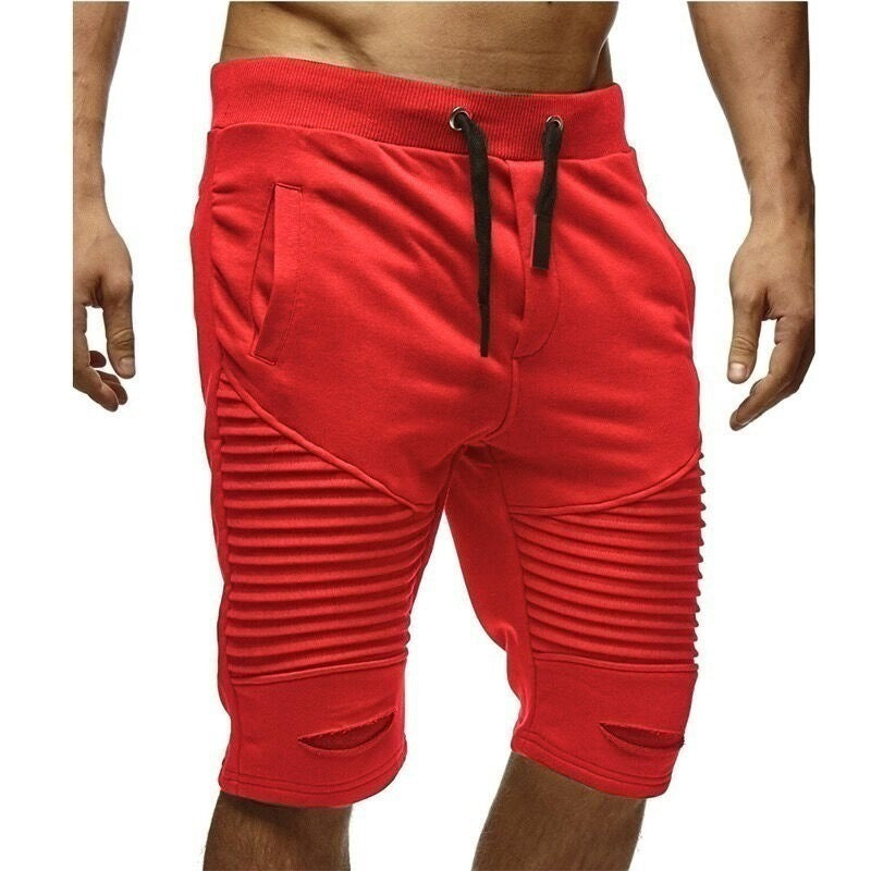 Shorts de sport pour hommes avec un design à bandes modernes et une taille élastique Chic und Stil