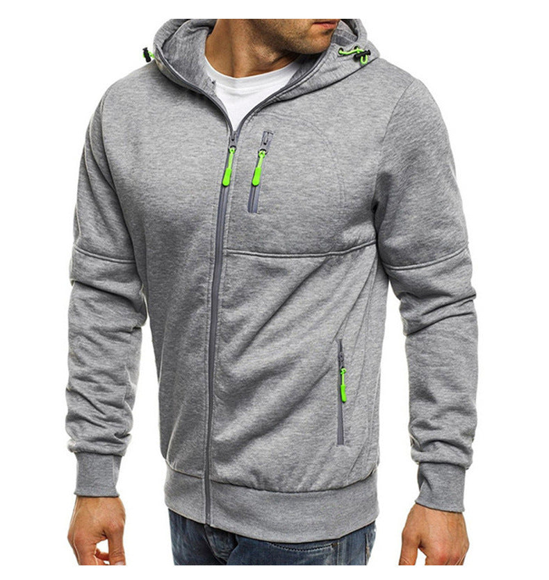 Veste à capuche de sport pour hommes avec poches zippées pratiques et matériau respirant Chic und Stil