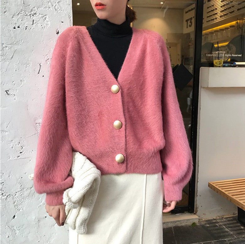 Dames Pull en maille pelucheuse avec détails de boutons Chic und Stil