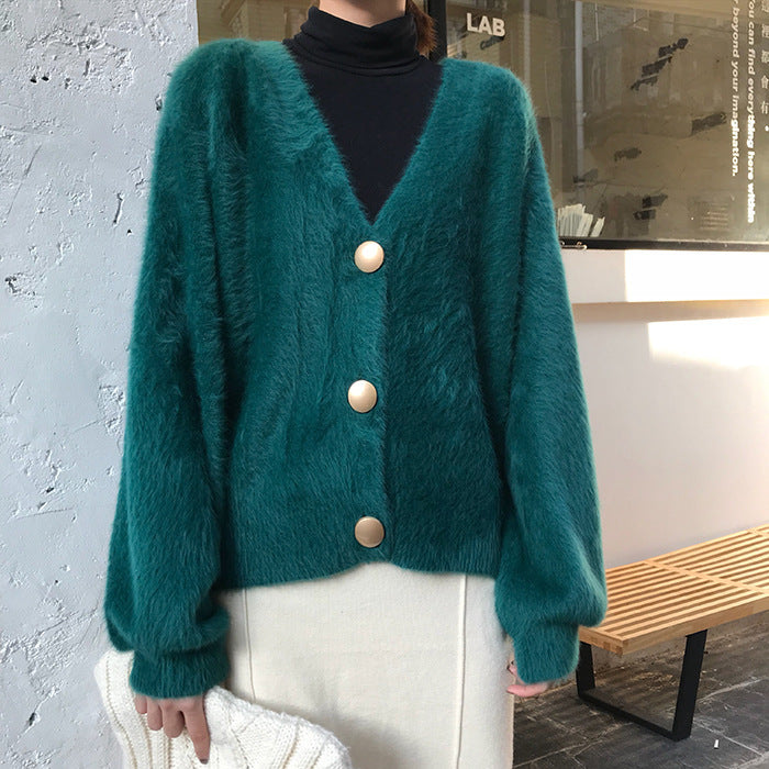 Dames Pull en maille pelucheuse avec détails de boutons Chic und Stil