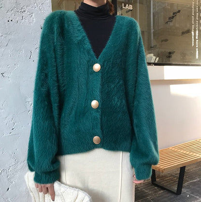Dames Pull en maille pelucheuse avec détails de boutons Chic und Stil