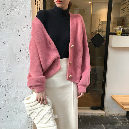 Dames Pull en maille pelucheuse avec détails de boutons Chic und Stil