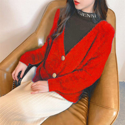 Dames Pull en maille pelucheuse avec détails de boutons Chic und Stil