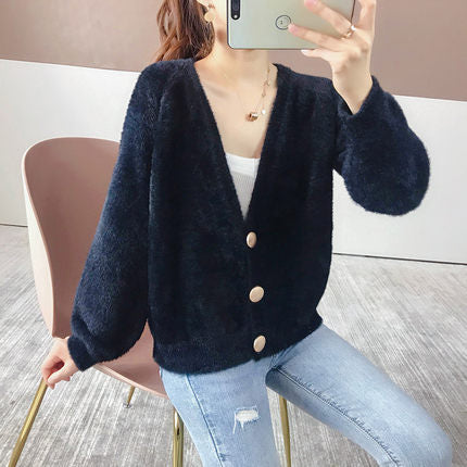 Dames Pull en maille pelucheuse avec détails de boutons Chic und Stil