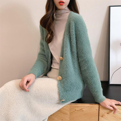 Dames Pull en maille pelucheuse avec détails de boutons Chic und Stil