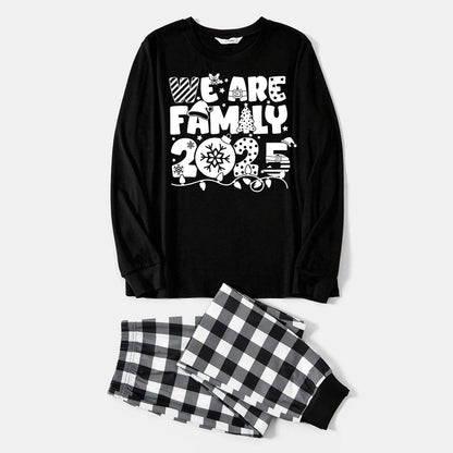 Chic und Stil | "We are Family 2025" White Letter Print Black Long Sleeve Top with Black and White Cropped Pants Family Set Pajamas