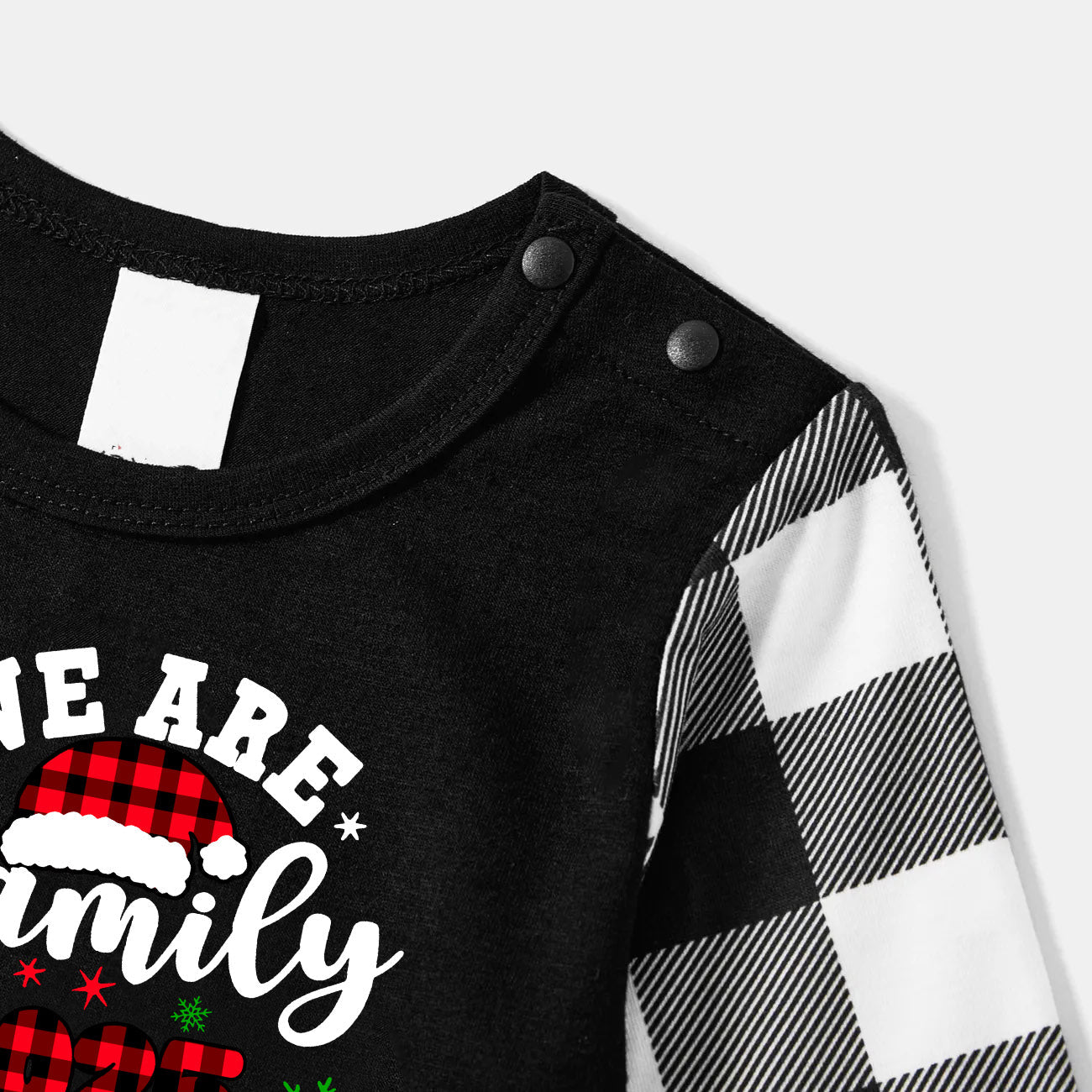 Chic und Stil | "We are Family2025" Santa Hat Monogram Print Black Long Sleeve Shirt with Black and White Checkered Pants Family Matching Pajamas