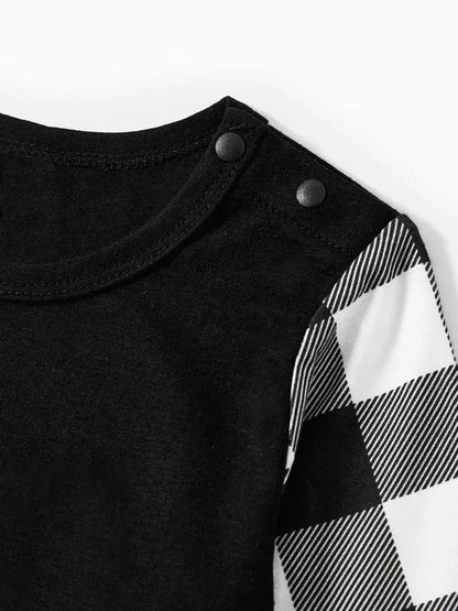 Chic und Stil | "2025 FAMILY CHRISTMAS" text and sled pattern - Black long sleeve top with black and white checkered pants family matching pajamas