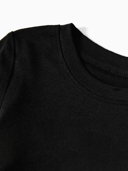 Chic und Stil | Christmas Family 2025 Create memories together Long sleeve black text print T-shirt with black and white checkered pants Matching family pajamas