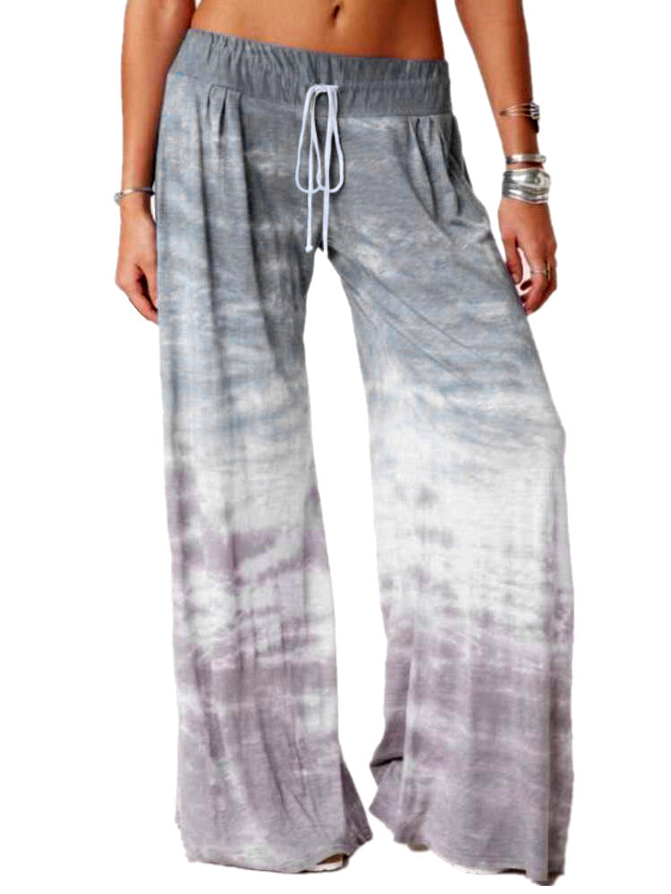 Wide beach pants for women with elastic waist and trendy batik design Chic und Stil