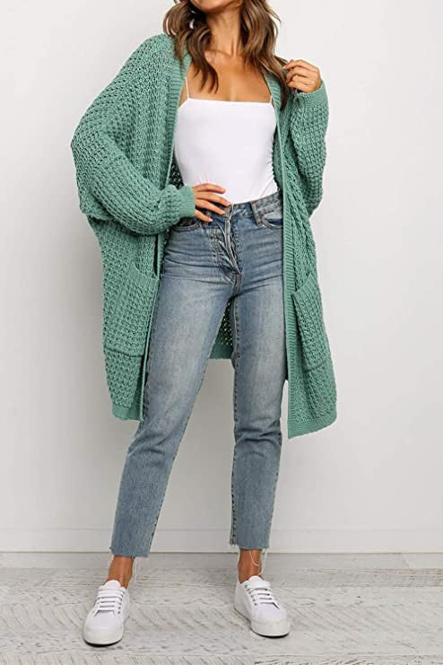 Dame Grosse Tricot Cardigan avec des manches volumineuses et des poches pratiques Chic und Stil