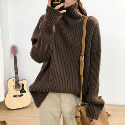 Chunky knit pullover for women with high collar and fine ribbed structure Chic and Style