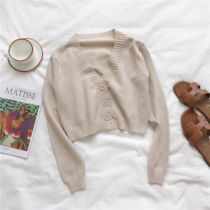 Dames gilet court en tricot avec décolleté en V et détails de boutons Chic und Stil