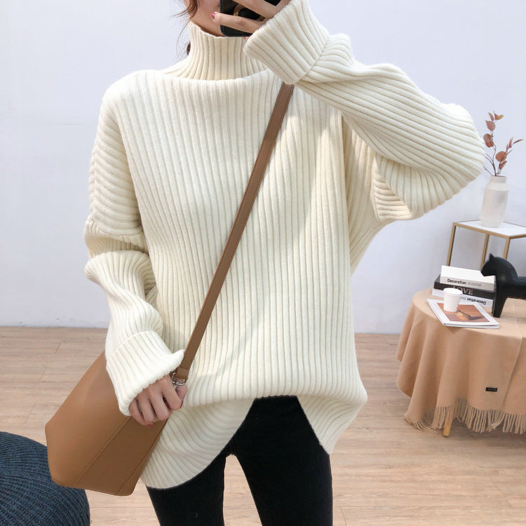 Chunky knit pullover for women with high collar and fine ribbed structure Chic and Style