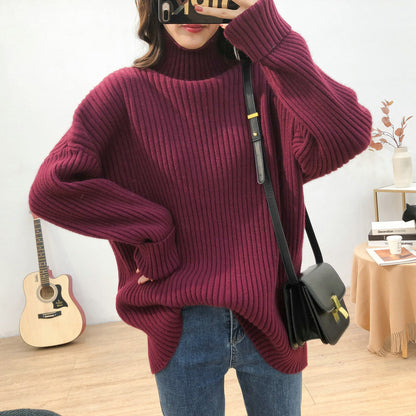 Chunky knit pullover for women with high collar and fine ribbed structure Chic and Style