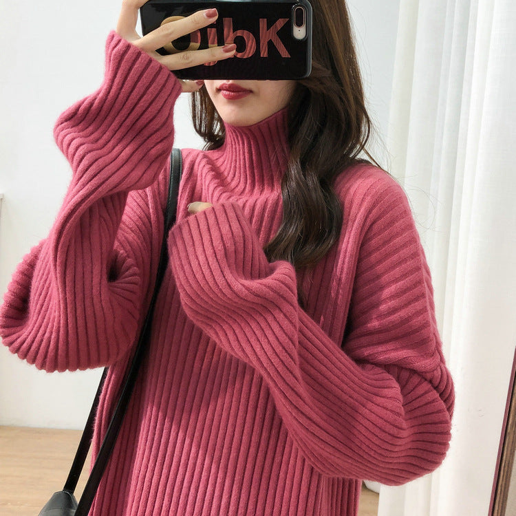 Chunky knit pullover for women with high collar and fine ribbed structure Chic and Style