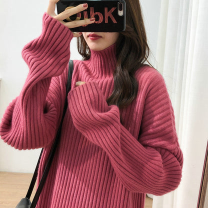 Chunky knit pullover for women with high collar and fine ribbed structure Chic and Style