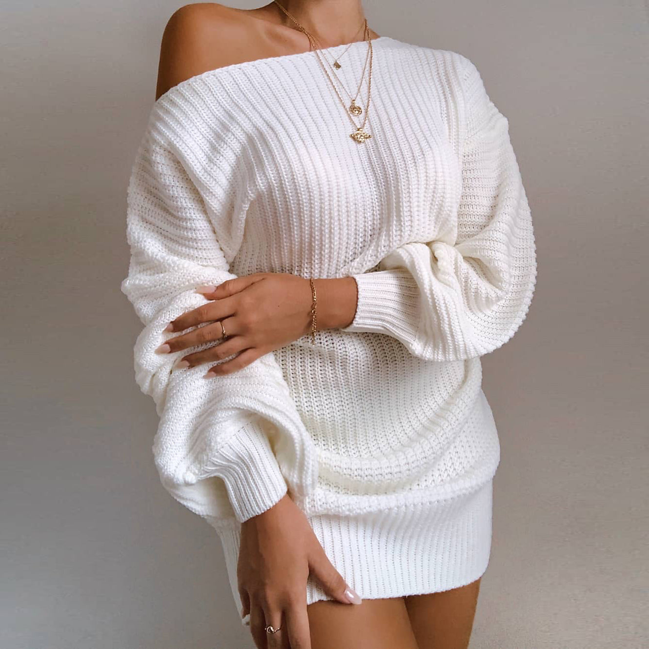 Robe en tricot off-shoulder pour femmes avec des manches volumineuses et une surface texturée Chic und Stil