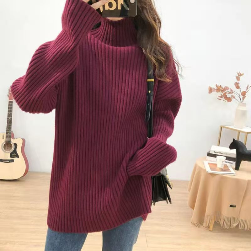 Chunky knit pullover for women with high collar and fine ribbed structure Chic and Style