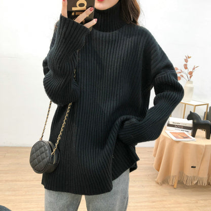 Chunky knit pullover for women with high collar and fine ribbed structure Chic and Style