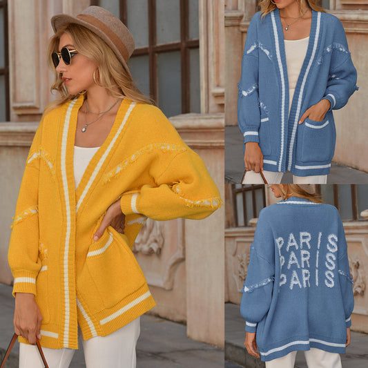Cardigan en tricot pour dames avec des franges tendance et des poches pratiques Chic und Stil
