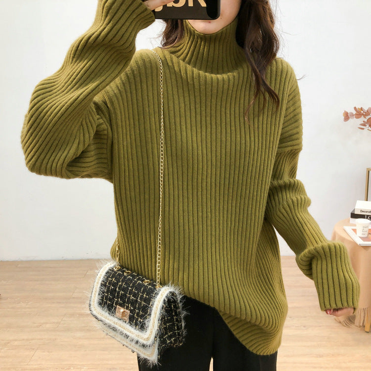 Chunky knit pullover for women with high collar and fine ribbed structure Chic and Style