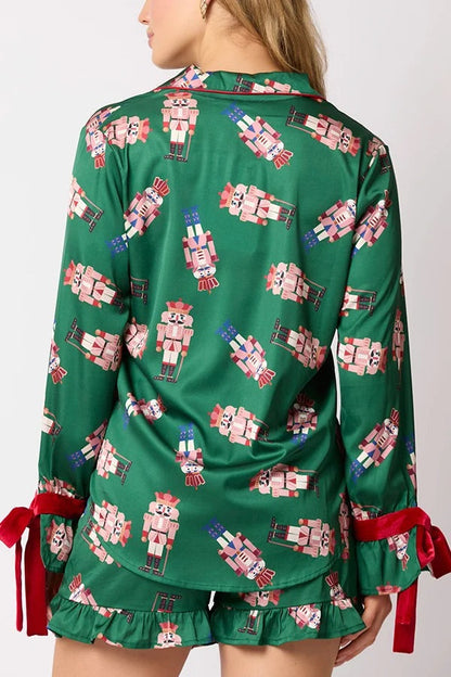 Chic und Stil | Christmas Fashion Printed Bow Tie Top and Elastic Waist Ruffled Shorts Set