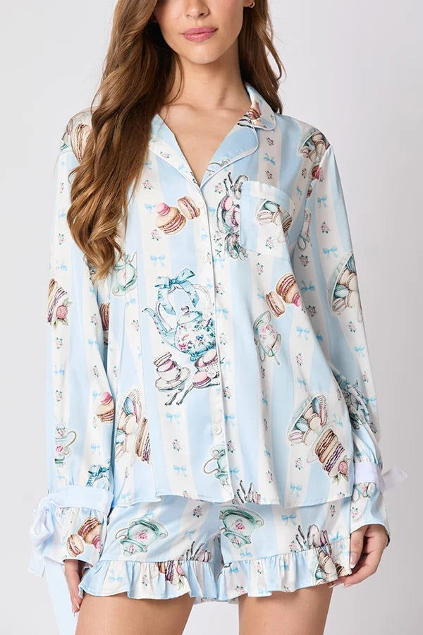 Chic und Stil | Christmas Fashion Printed Bow Tie Top and Elastic Waist Ruffled Shorts Set