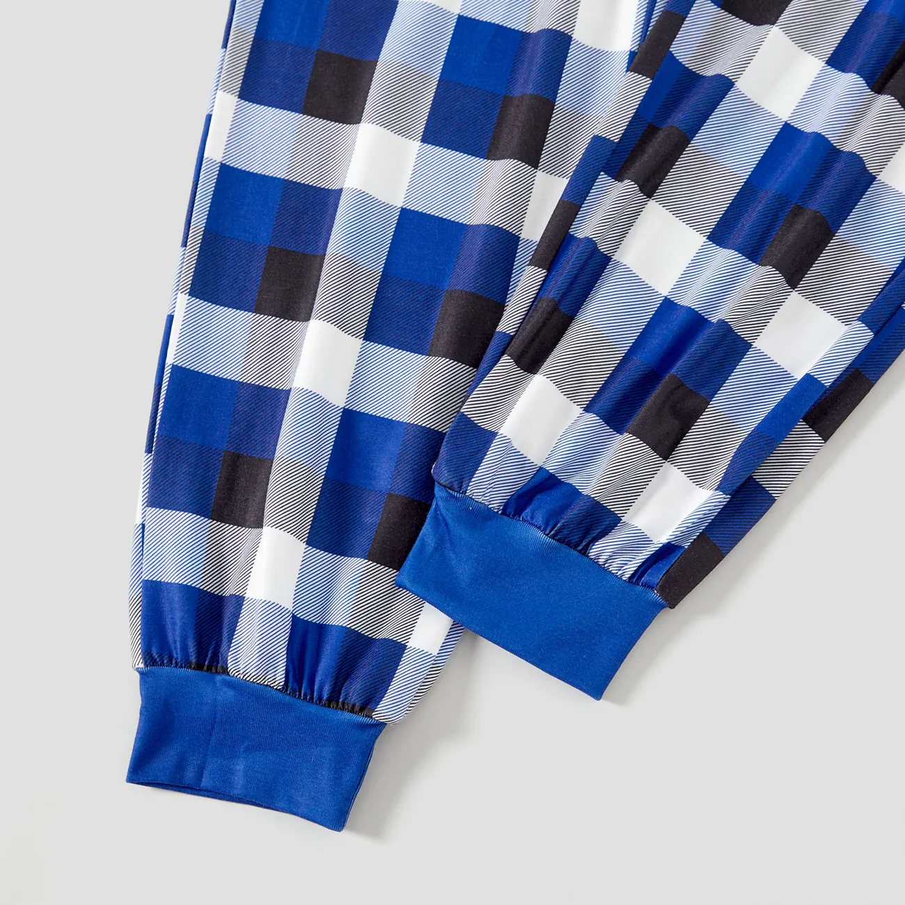 Chic und Stil | Stylish White Letter Print "Believe" Blue Long Sleeve with Blue-White-Black Checked Pants Family Matching Pajamas