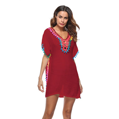 Robe de plage ornée de pompons vifs pour femmes Chic und Stil