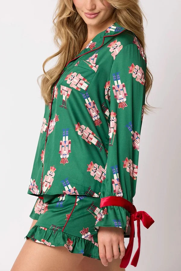Chic und Stil | Christmas Fashion Printed Bow Tie Top and Elastic Waist Ruffled Shorts Set