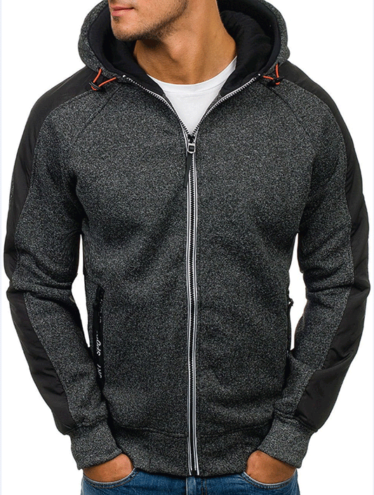 Veste à capuche sportive pour hommes avec design de panneaux innovant Chic und Stil