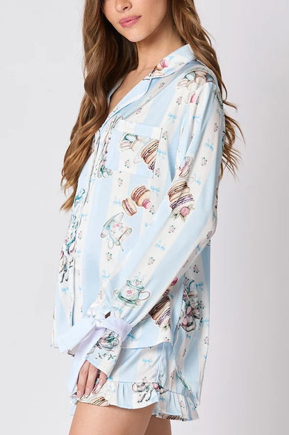 Chic und Stil | Christmas Fashion Printed Bow Tie Top and Elastic Waist Ruffled Shorts Set