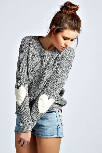 Pull femme avec appliqués en forme de cœur et coupe décontractée Chic und Stil