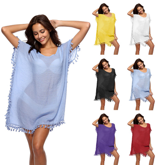 Ladies poncho with fringe trim Chic and Style