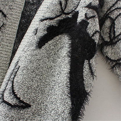 Robe en tricot pour femmes avec un design graphique artistique et un élégant décolleté en V Chic und Stil