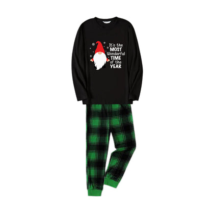 Chic und Stil | Christmas family pajamas matching - Black top and green checkered pants PJ set with cute gnome and Christmas slogan print