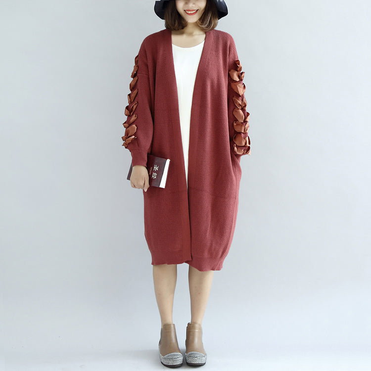 Chic und Stil | cardigan in knitted red oversized pull coats with decorated sleeves
