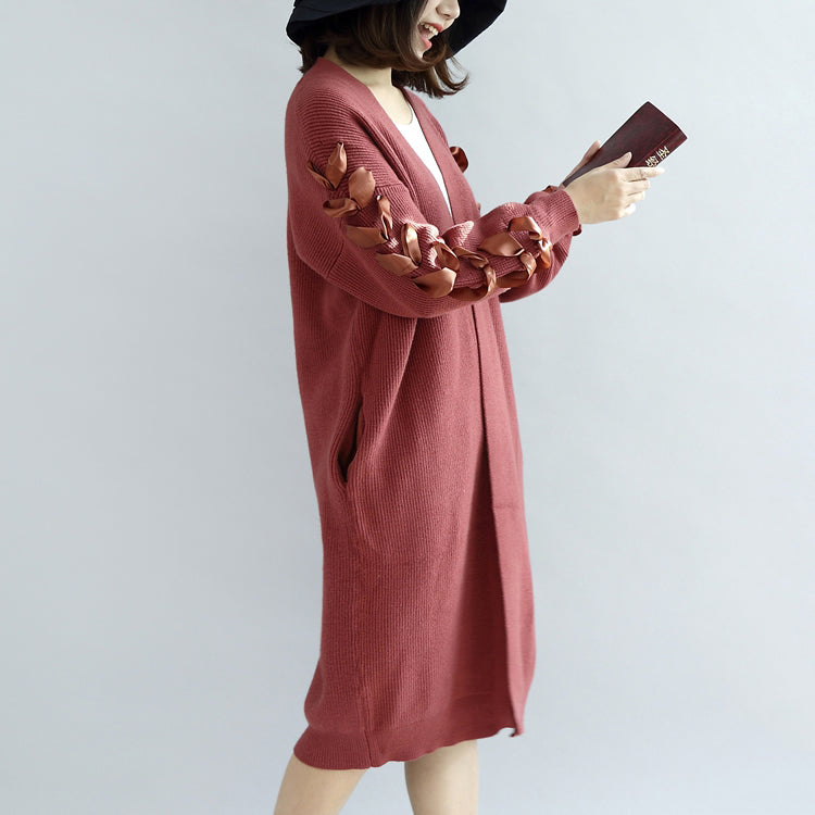 Chic und Stil | cardigan in knitted red oversized pull coats with decorated sleeves