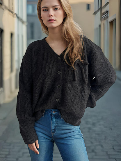 Dame Cardigan avec un motif de structure fin et des détails de bouton décoratifs Chic und Stil