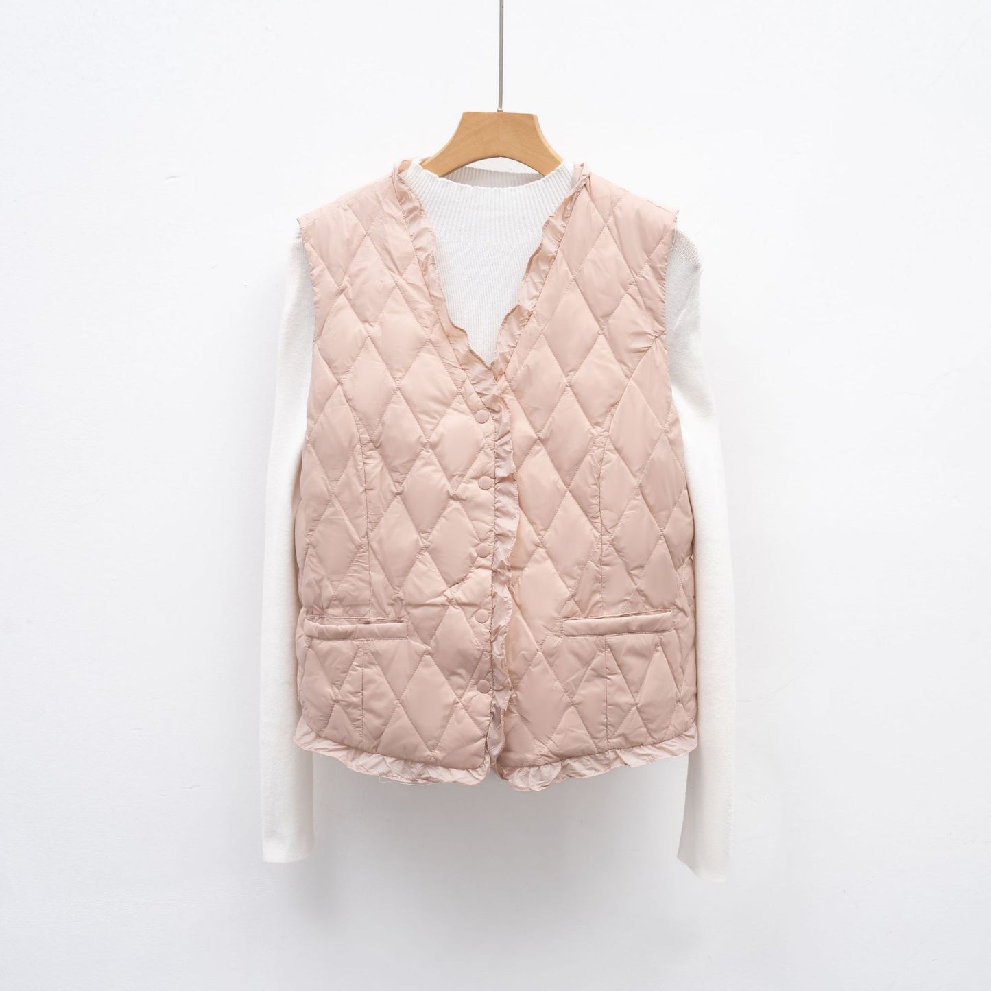 Dames gilet matelassé avec coupe asymétrique Chic und Stil