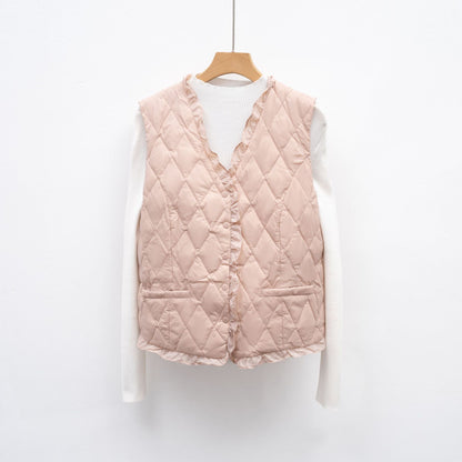 Dames gilet matelassé avec coupe asymétrique Chic und Stil