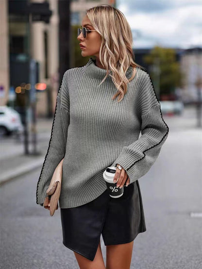 Pull en tricot pour femmes avec un col roulé élégant et des ouvertures de manches tendance Chic und Stil