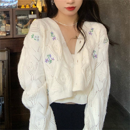 Dames gilet court en tricot avec accents floraux et motif ajouré Chic und Stil